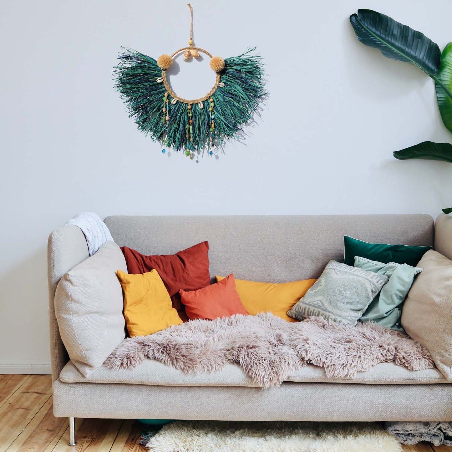 Caribbean-Inspired Boho Wall Decor with Shells and Pom Poms